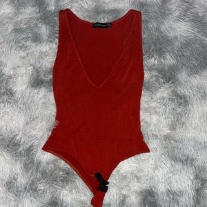 red bodysuit